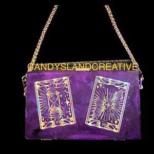 One of a kind resin halo tarot card purple clutch with black chain.